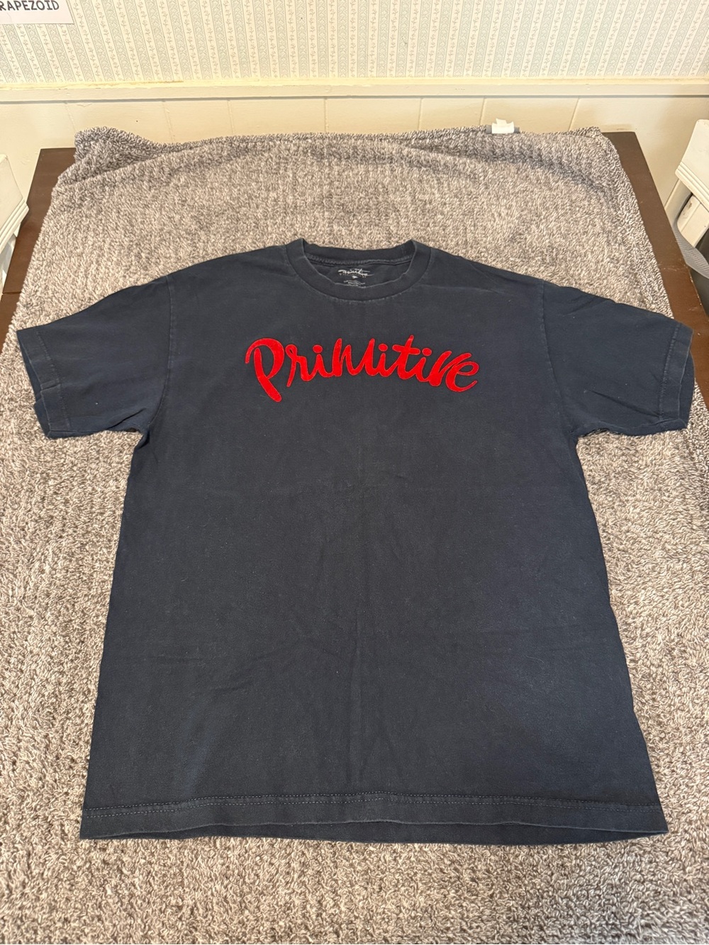 Primitive Men’s Navy Blue T-Shirt with Red Logo